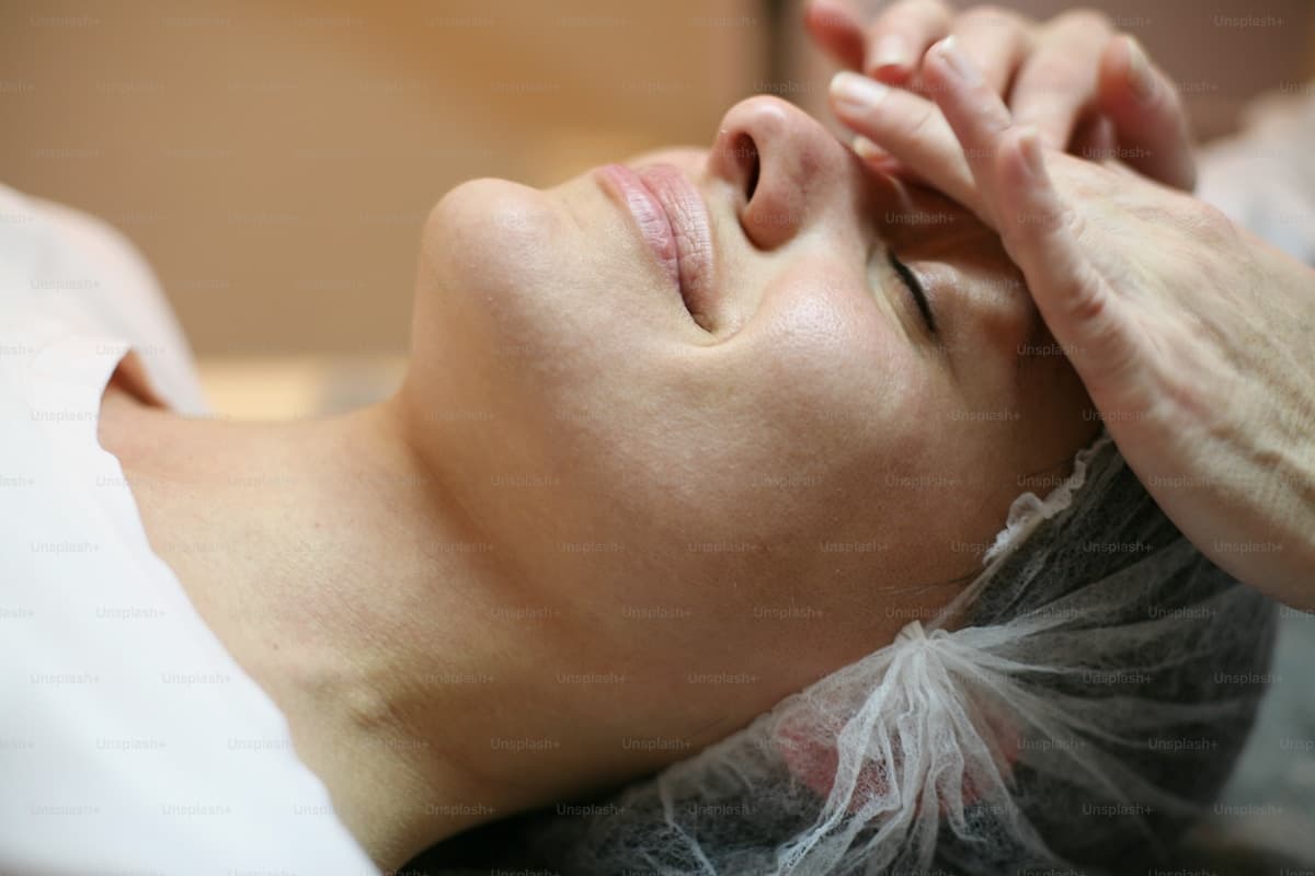 Close-up of a relaxing facial Ayurvedic treatment.